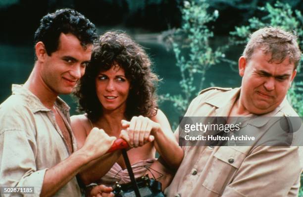 Tom Hanks, Rita Wilson and John Candy pose for the TriStar Pictures movie "Volunteers" circa 1984.