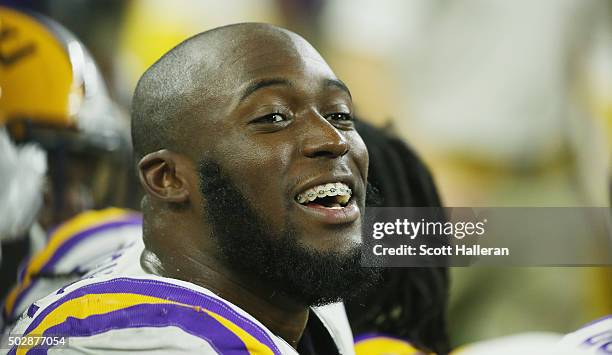 Leonard Fournette of the LSU Tigers waits on the bench during the second half of their game against the Texas Tech Red Raiders during the AdvoCare...