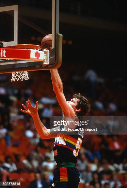 Kiki Vandeweghe of the Denver Nuggets goes up to shoot against the Houston Rockets during an NBA basketball game circa 1982 at The Summit in Houston,...