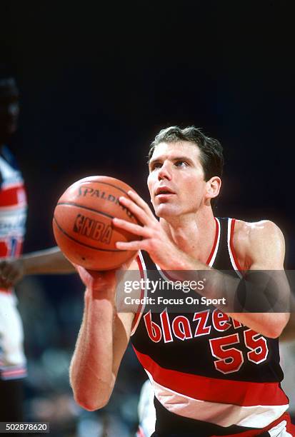 Kiki Vandeweghe of the Portland Trail Blazers shoots a free throw against the Washington Bullets during an NBA basketball game circa 1986 at the...