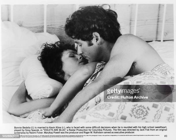 Bonnie Bedelia and Kevin Kline in a romantic scene for the movie "Violets Are Blue..." circa 1985.