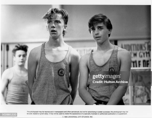 Actors Ilan Mitchell-Smith and Anthony Michael Hall talk in a scene of the Universal Studio movie "Weird Science"