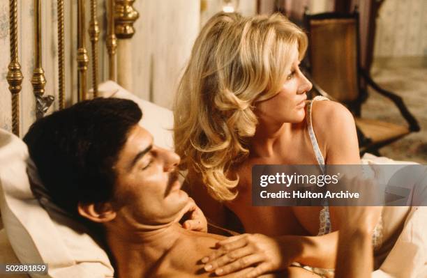 Richard Benjamin in bed with a women robot in a scene from the MGM movie "Westworld" circa 1973.