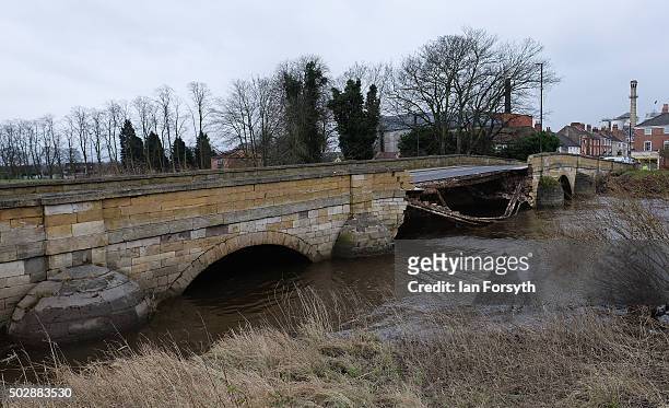 View looking over the collapsed bridge over the River Wharfe that collapsed due to flooding on December 30, 2015 in Tadcaster, England. Heavy rain...
