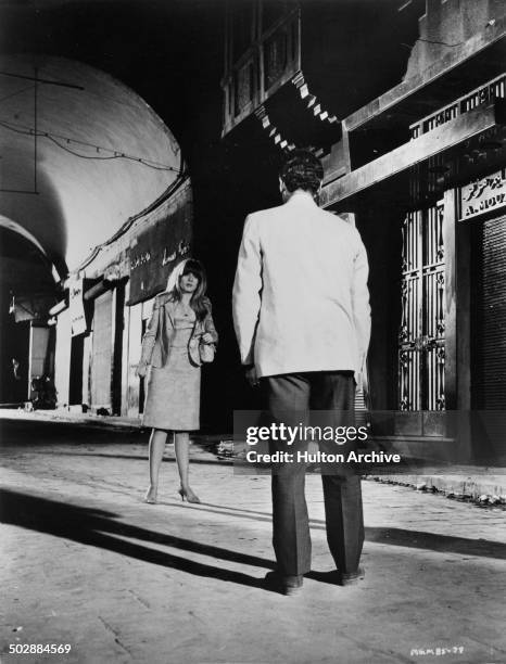 Francoise Dorleac says goodbye to David Niven in a scene from the MGM movie "Where the Spies Are" circa 1965.