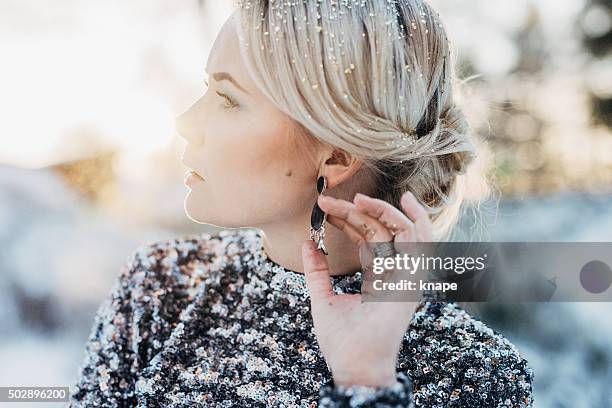 beautiful woman outdoors in winter - silver sequins stock pictures, royalty-free photos & images