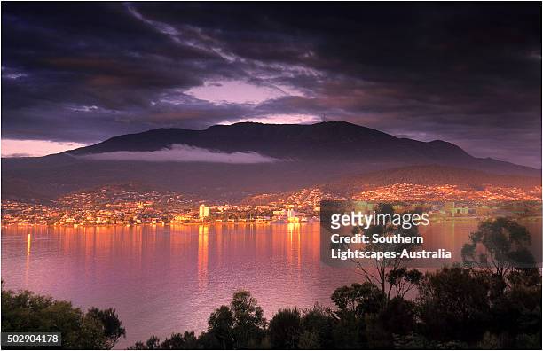 hobart city at dawn as viewed from rosny point, southern tasmania. - hobart tasmania stock pictures, royalty-free photos & images
