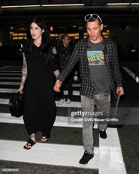 Kat Von D and Steve O are seen at LAX on December 29, 2015 in Los Angeles, California.