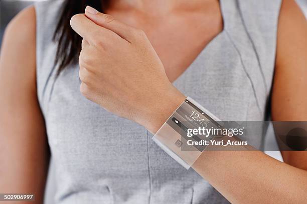 keeping up with technology - smart watch on wrist stock pictures, royalty-free photos & images