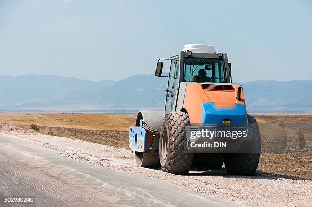 road under construction - asphalting stock pictures, royalty-free photos & images