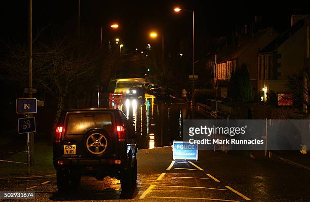 Flood water blocks Kingsmeadows Road after rain fall from Storm Frank caused the river Tweed to burst it's banks on December 30, 2015 in Peebles,...