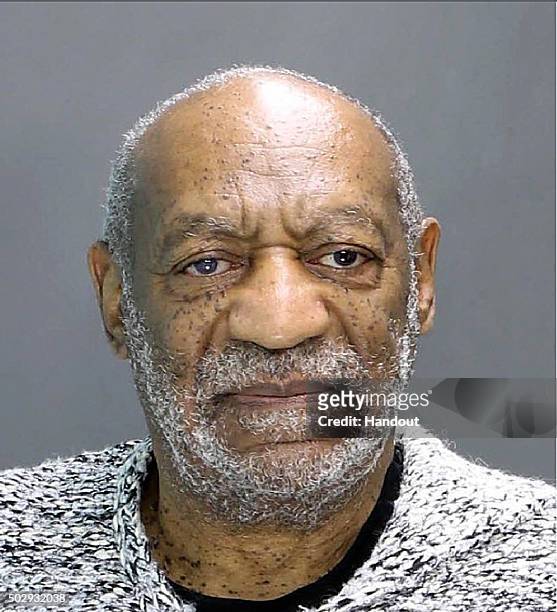 In this handout image provided by the Elkins Park, Montgomery County District Attorney's office, William H. Cosby poses for a mugshot photo during...