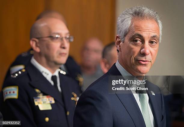 Interim Chicago Police Superintendent John Escalante listens as Chicago Mayor Rahm Emanuel addresses changes in training and procedures that will...