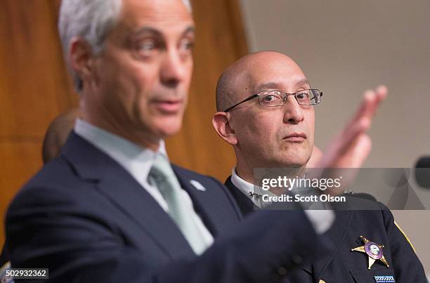 Interim Chicago Police Superintendent John Escalante listens as Chicago Mayor Rahm Emanuel addresses changes in training and procedures that will...