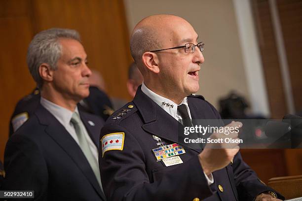 Chicago Mayor Rahm Emanuel listens as Interim Chicago Police Superintendent John Escalante addresses changes in training and procedures that will...