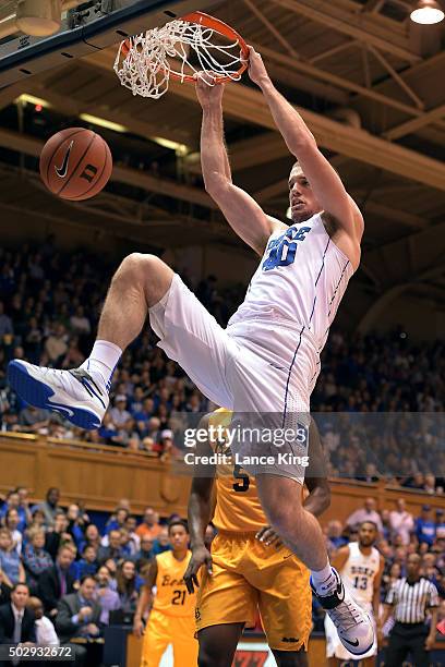 Marshall Plumlee of the Duke Blue Devils dunks against the Long Beach State 49ers at Cameron Indoor Stadium on December 30, 2015 in Durham, North...