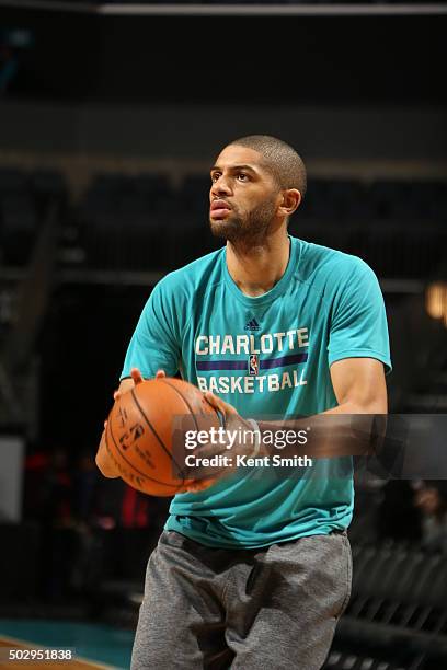 Nicolas Batum of the Charlotte Hornets warms up before the game against the Los Angeles Clippers on December 30, 2015 at Time Warner Cable Arena in...