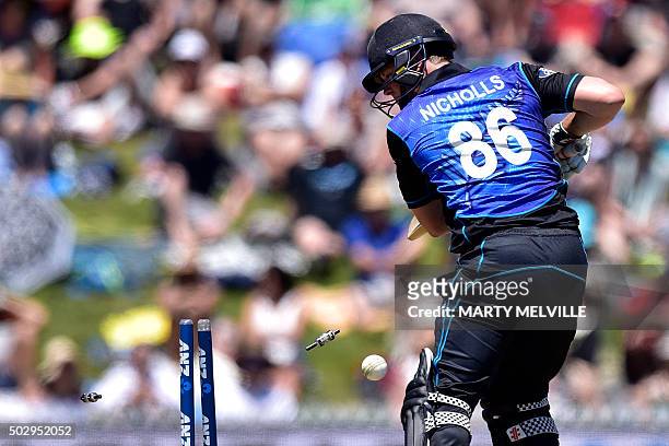 Henry Nichols of New Zealand is bowled by Chamara Kapugedera of Sri Lanka during the 3rd One Day International cricket match between New Zealand and...