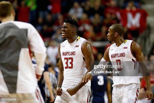 Diamond Stone of the Maryland Terrapins and Rasheed Sulaimon celebrate during a timeout late in the second half of Maryland's 70-64 win over the Penn...