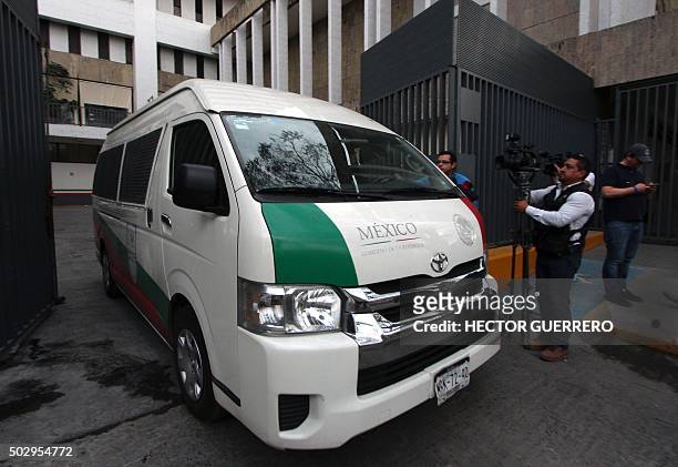 View of the police van carrying US Ethan Couch while heading to the Mexican migration office in Guadalajara City on December 30, 2015. Authorities in...