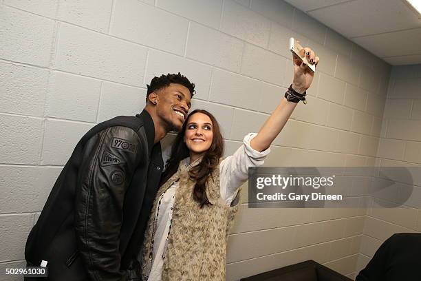 Bollywood Actress Neha Dhupia poses after the game with Jimmy Butler of the Chicago Bulls on December 30, 2015 at the United Center in Chicago,...