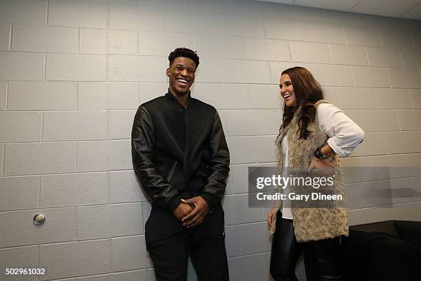 Bollywood Actress Neha Dhupia meets Jimmy Butler of the Chicago Bulls after the game against the Indiana Pacers on December 30, 2015 at the United...