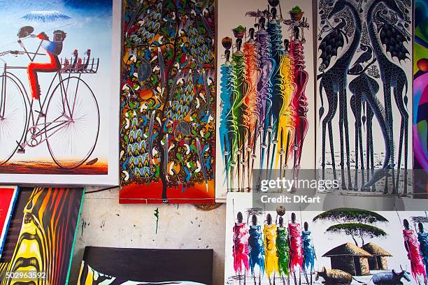 tingatinga paintings in tanzania - painted image paintings art stock pictures, royalty-free photos & images