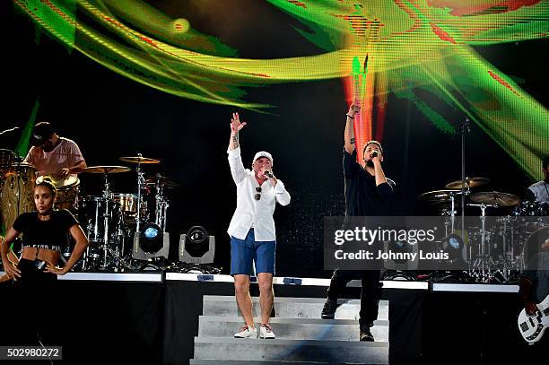 Pitbull and Jussie Smollett during Pitbull's New Year's Revolution rehearsal at Bayfront Park Amphitheater on December 30, 2015 in Miami, Florida.