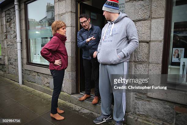 First Minister of Scotland Nicola Sturgeon talks to locals as she tours the flood ravaged town of Newton Stewart in Galloway after Storm Frank caused...