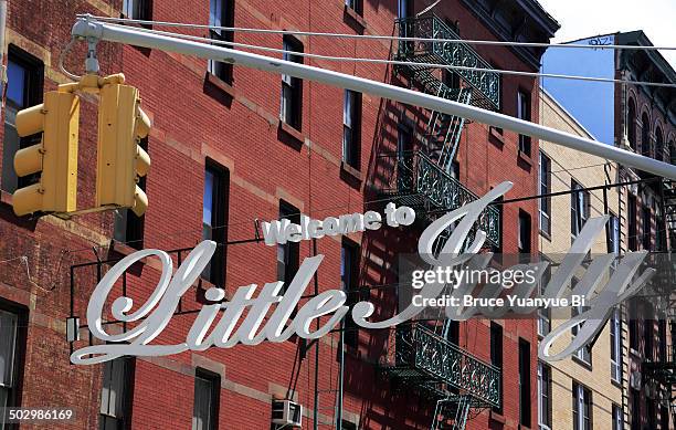 the sign of welcome to little italy - little italy stock pictures, royalty-free photos & images