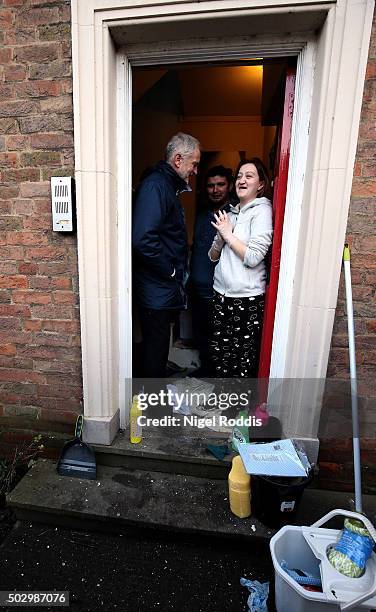 Labour leader Jeremy Corbyn visits a house after flooding in York on December 31, 2015 in York, England. The Met Office have issued yellow warnings...