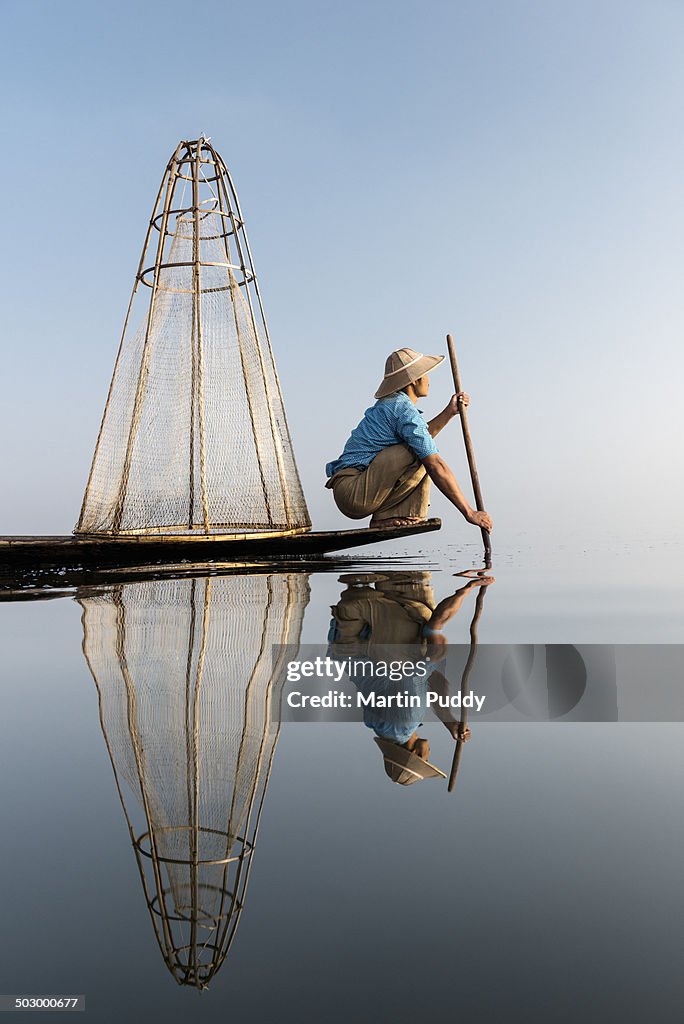 Myanmar, Inle lake, traditional fisherman on boat