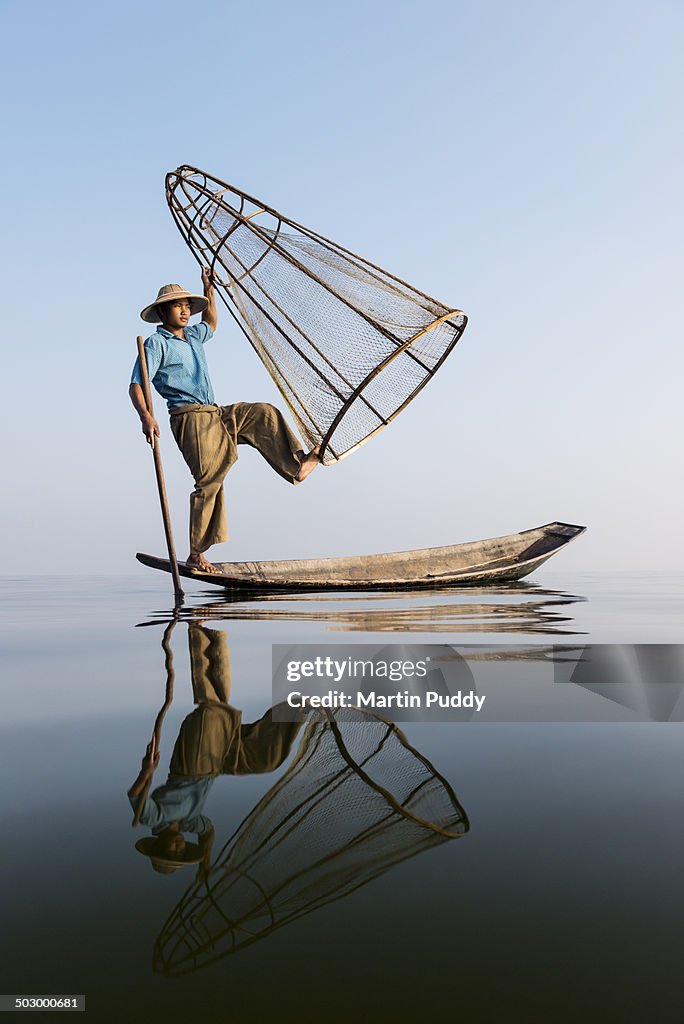 Myanmar, Inle lake, traditional fisherman on boat