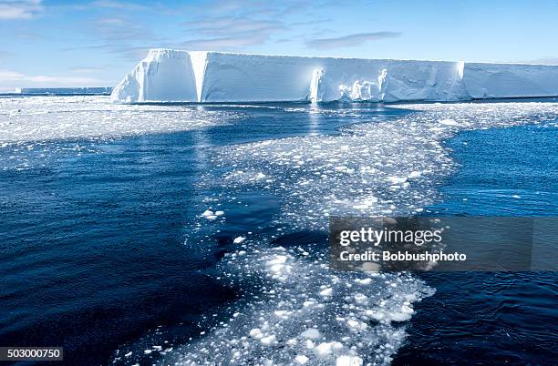 tabular iceberg and brash ice, antarctica - antarctic ocean stock pictures, royalty-free photos & images