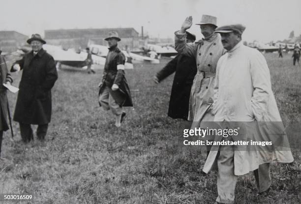 Crown Prince Wilhelm of Prussia as spectators on the first day of the Germany flight at the airport Berlin-Staaken. 24th August 1933. Photograph.
