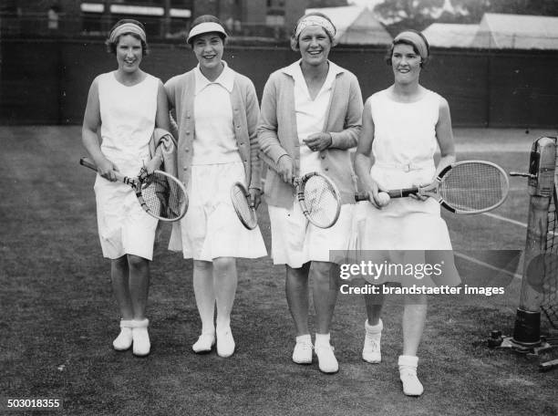 The tennis players Sarah Palfrey and Edith Cross and Cecily Aussem and Mianne Palfrey at Wimbledon. 21th June 1930. Photograph.