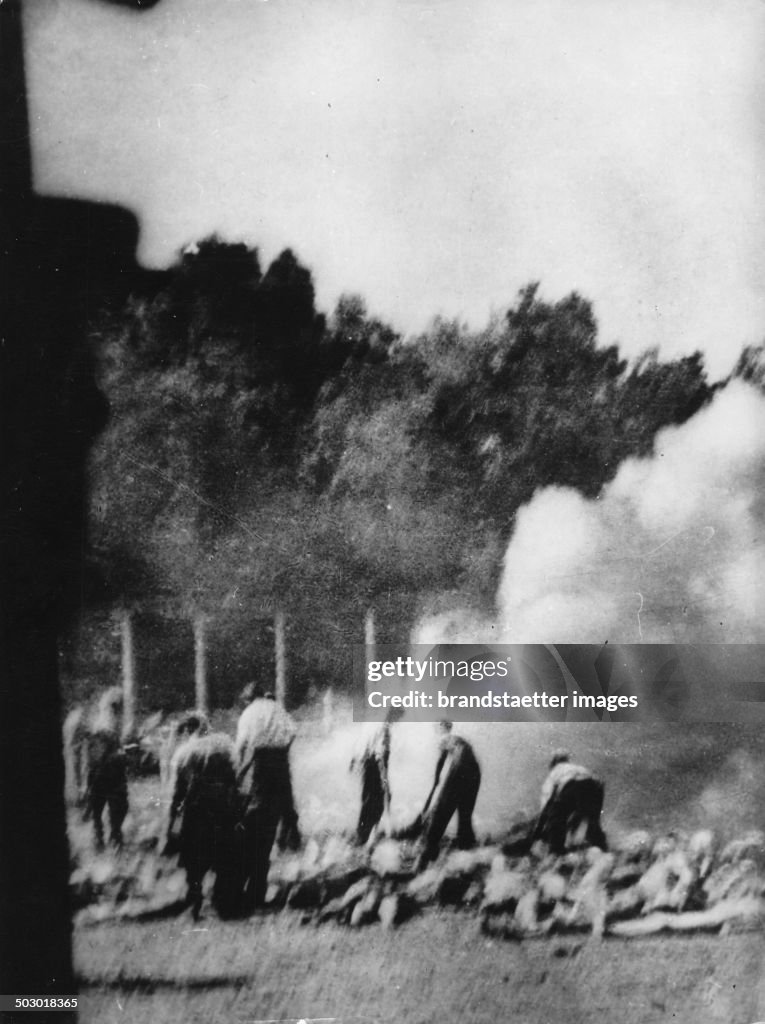 Cremation In Auschwitz. Secret Photograph Taken By A Prisoner. Auschwitz. Poland. C. 1943.