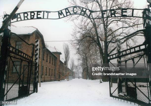 Entrance to the concentration camp Auschwitz-Birkenau. Poland. Photograph from 1995. .