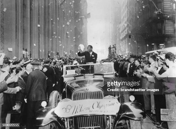 The American runner and three-time Olympic champion Jesse Owens at the return in USA. Broadway. 13 Semptember 1936. P Photograph.