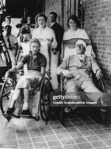 The after a crash injured pilots Amy Johnson and Jim Mollison. 1st August 1933. Photograph.