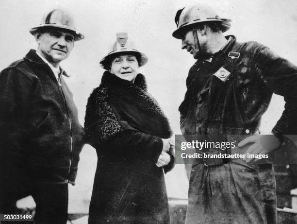 Frances Perkins - U.S. Secretary of Labor - at the construction site for the Golden Gate Bridge in San Francisco. 5th April 1935. Photograph.