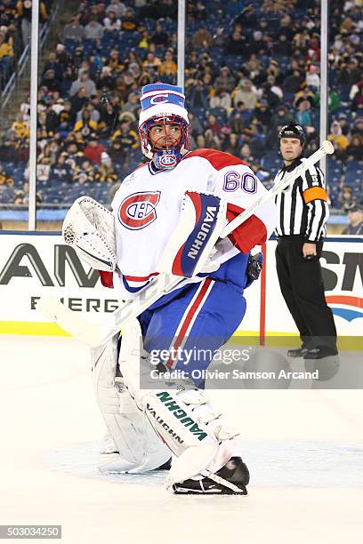 Jose Theodore of the Montreal Canadiens skates against the Boston Bruins in the alumni game on December 31, 2015 during 2016 Bridgestone NHL Winter...