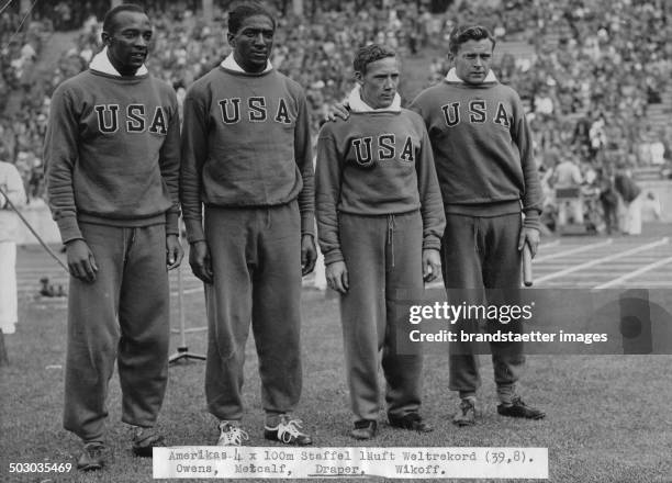 The American 4 x 100 meters team wins the gold medal. From left to right Jessie Owens - Ralph Metcalf - Foy Draper - Frank Wykoff. Olympic Games in...