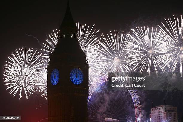 Fireworks light up the London skyline and Big Ben just after midnight on January 01, 2016 in London, England. Thousands of people have bought tickets...