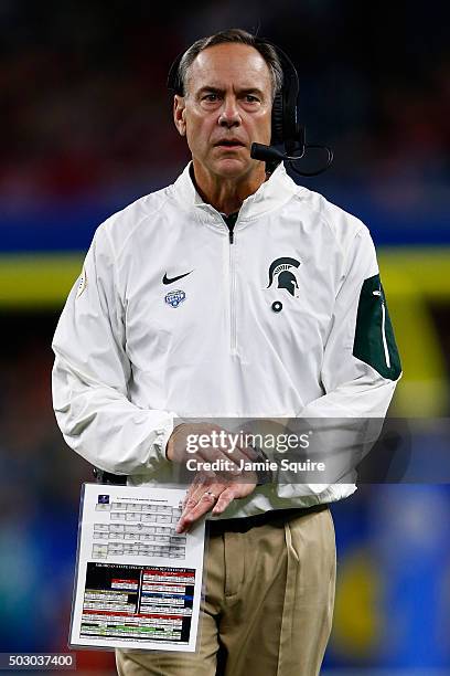 Head coach Mark Dantonio of the Michigan State Spartans looks on while taking on the Alabama Crimson Tide in the first half during the Goodyear...