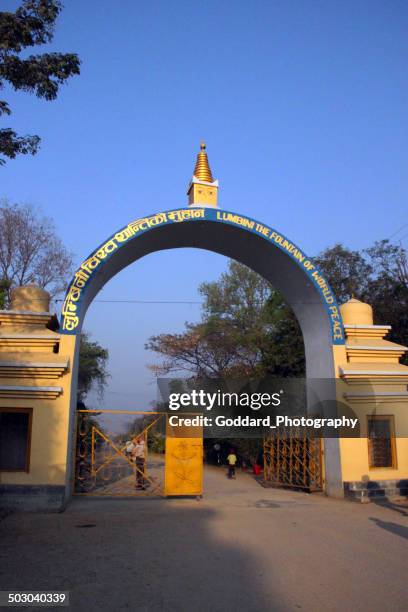 nepal: entrance to buddha's birthplace in lumbini - buddhism at lumbini stock pictures, royalty-free photos & images