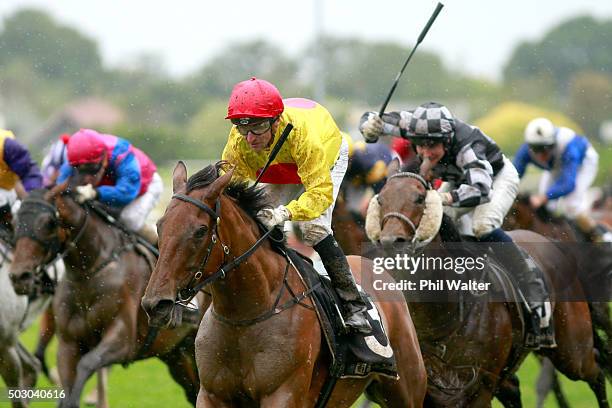 Opie Bosson riding Decorah wins the City of Auckand Cup at Ellerslie Racecourse on January 1, 2016 in Auckland, New Zealand.