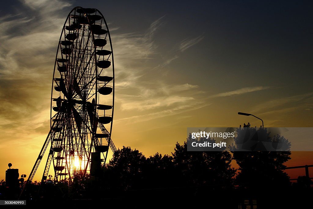 Huge ferris wheel at sunset