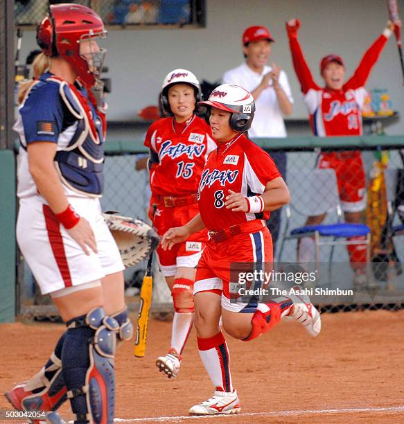Megu Hirose of Japan scores by a RBI single of Ayumi Kano in the bottom of fifth inning during the Softball Women's World Championship medal round...