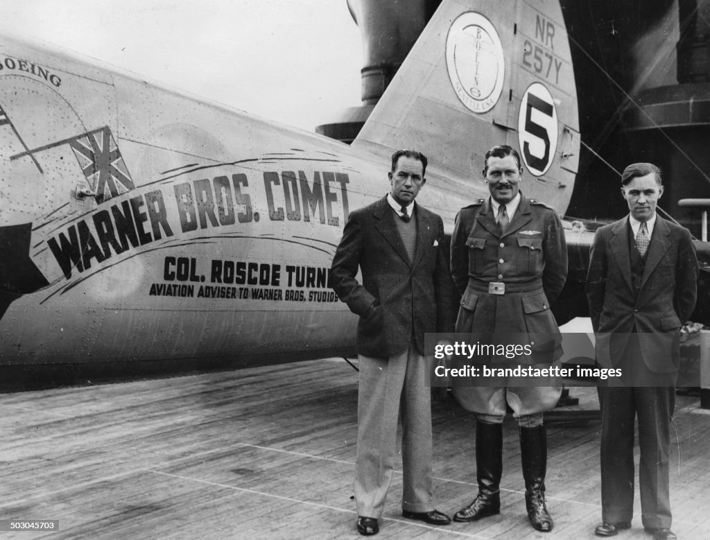 Clyde Pangborn - The Flight Pilot Roscoe Turner - R. Nichols (Left To Right) With The Plane Turners On Deck Of The Steamboat Washington On Their Arrival In Southampton. 2Nd October 1934. Photograph.